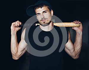 Muscular man with baseball bat