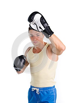 Muscular man boxing