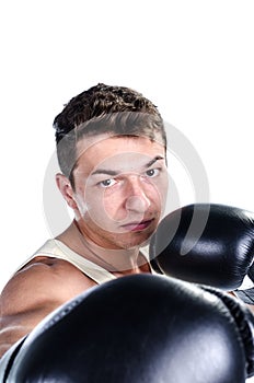 Muscular man boxing