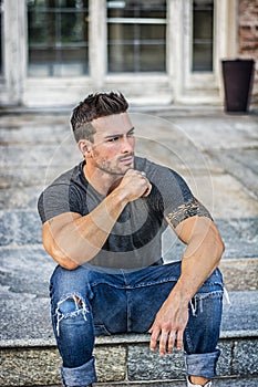 Muscular man in city center