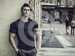 Muscular man in city centre