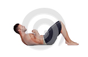 Muscular man doing abdominals