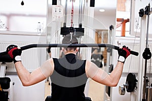 Muscular Man Exercising In Gym - Bodybuilder