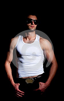 muscular man in a fashion pose