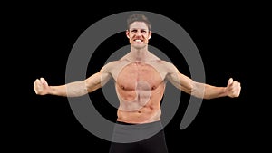Muscular man flexing muscles in front of camera