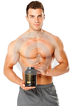 Muscular man holding container