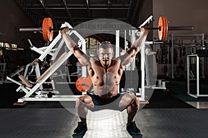 Muscular man lifting a barbell