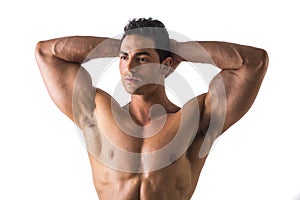Muscular Man Looking Afar While Holding his Head