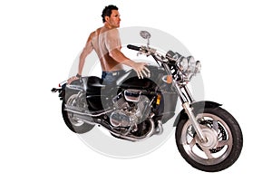 Muscular man and motorcycle.