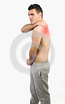 Muscular man with muscle pain