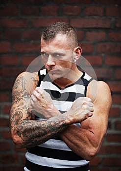 Muscular man with tattoo