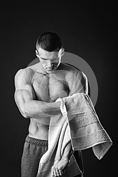 Muscular man with the towel