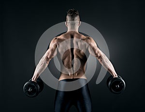 Muscular man weightlifting