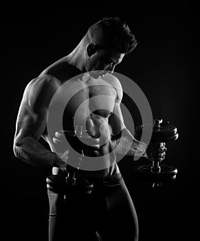 Muscular man weightlifting