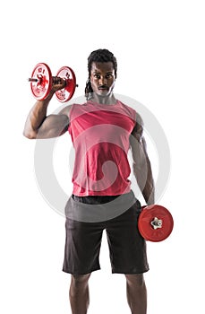 Muscular young black man exercising biceps