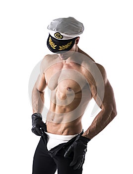 Muscular shirtless male sailor with nautical hat