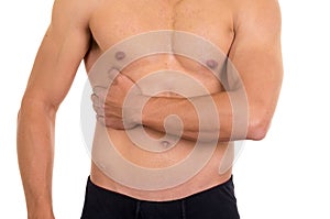 Muscular shirtless man with right abdomen pain