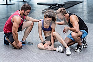 Muscular woman having a muscle injury