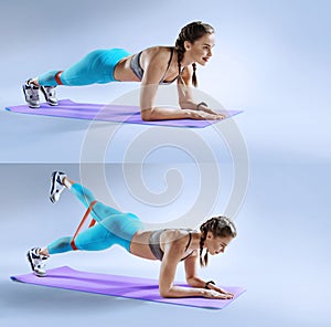 Muscular woman on a plank position use fitness gum. Muscular and strong girl exercising.