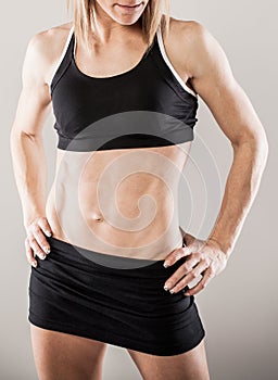 Muscular woman posing photo