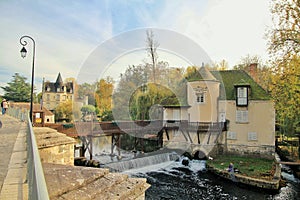 The musee du sucre dorge on the river Loign, city of Moret-Sur-Loign in autumn, France photo