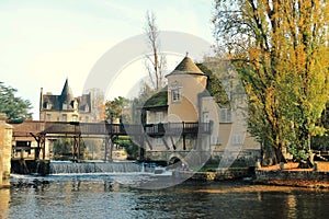The musee du sucre dorge on the river Loign, city of Moret-Sur-Loign in autumn, France photo