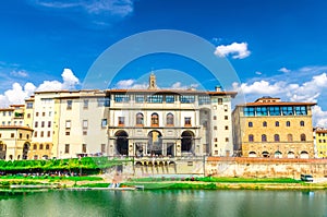 Museo Galileo museum, Gallerie degli Uffizi gallery and buildings on embankment promenade of Arno river in Florence photo