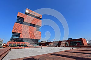 Museum aan de Stroom (MAS) located along river Scheldt is a 60m tall building designed by Neutelings Riedijk Architects