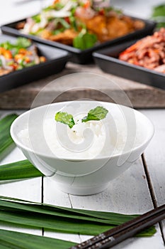 Mush or boiled rice in bowl asian food style