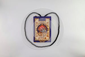 Mushaf or holy book al qur'an and prayer beads