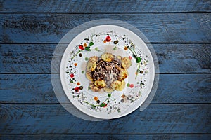 Mushroom beef stroganoff, with champignons and potato pancakes.