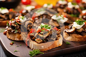 mushroom bruschetta shared on festive dinner table