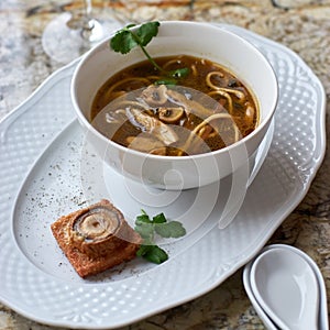 Mushroom soup with egg noodles