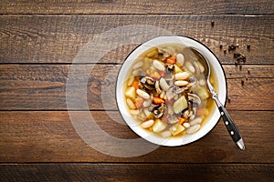 Mushroom soup with kidney bean, potato and carrot