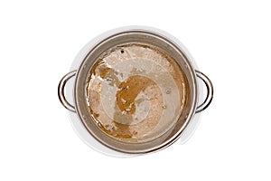 Mushroom soup in a pot with handles, a flat top view, isolated on a white background with a clipping path.