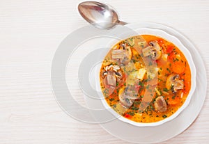 Mushroom soup with rice and vegetables