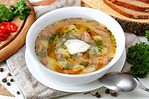 Mushroom soup with vegetables and bread