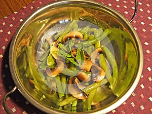 Mushrooms beans in a serving dish