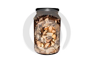 Mushrooms marinated boletus in a jar on a white background.