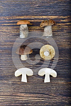 Mushrooms on a wooden background