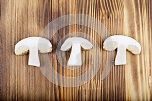 Mushrooms on a wooden background