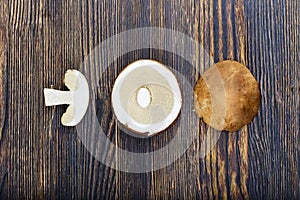 Mushrooms on a wooden background