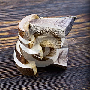 Mushrooms on a wooden background