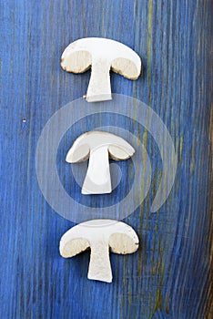 Mushrooms on a wooden background