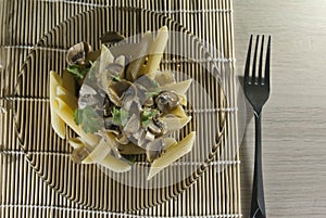 Mushroon sauce pasta on a plate