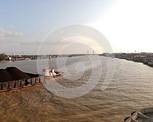 This is the Musi River, one of the icons of the very beautiful city of Palembang