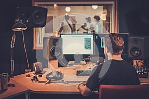 Music band in a cd recording studio