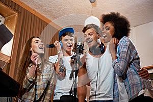 Music band during cd recording in studio