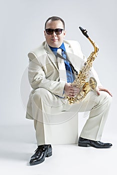 Music Concepts and Ideas. Portrait of Male Stylish Saxophone Player