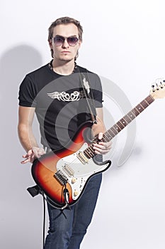 Music Concepts. Portrait of Young Caucasian Guitar Player